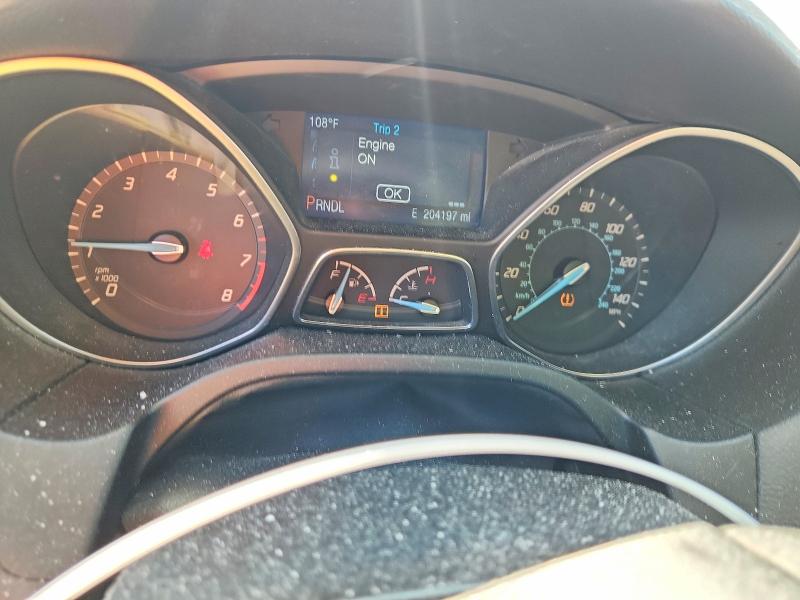 Photo 9 from auction – 2014 FORD FOCUS with VIN 1FADP3F2XEL457918