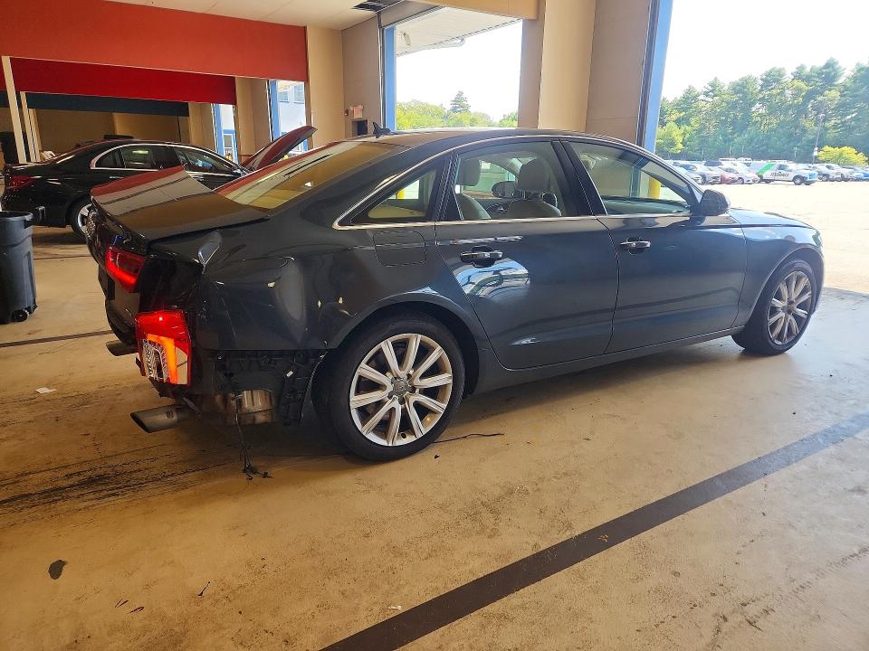 Foto 3 de la subasta – 2015 AUDI A6 con VIN WAUGFAFC7FN011039