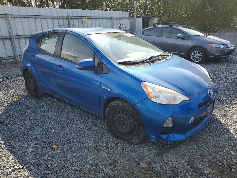 Photo 4 from auction – 2013 TOYOTA PRIUS C with VIN JTDKDTB38D1543652