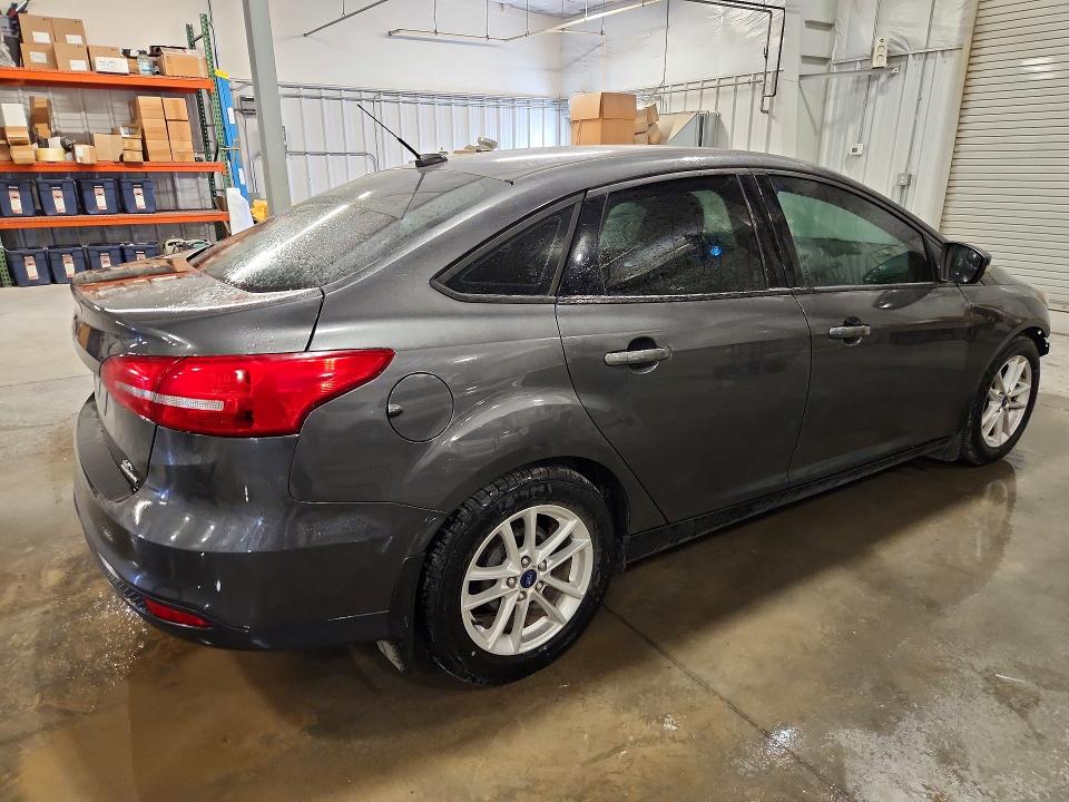 Photo 3 from auction – 2016 FORD FOCUS with VIN 1FADP3F26GL315357