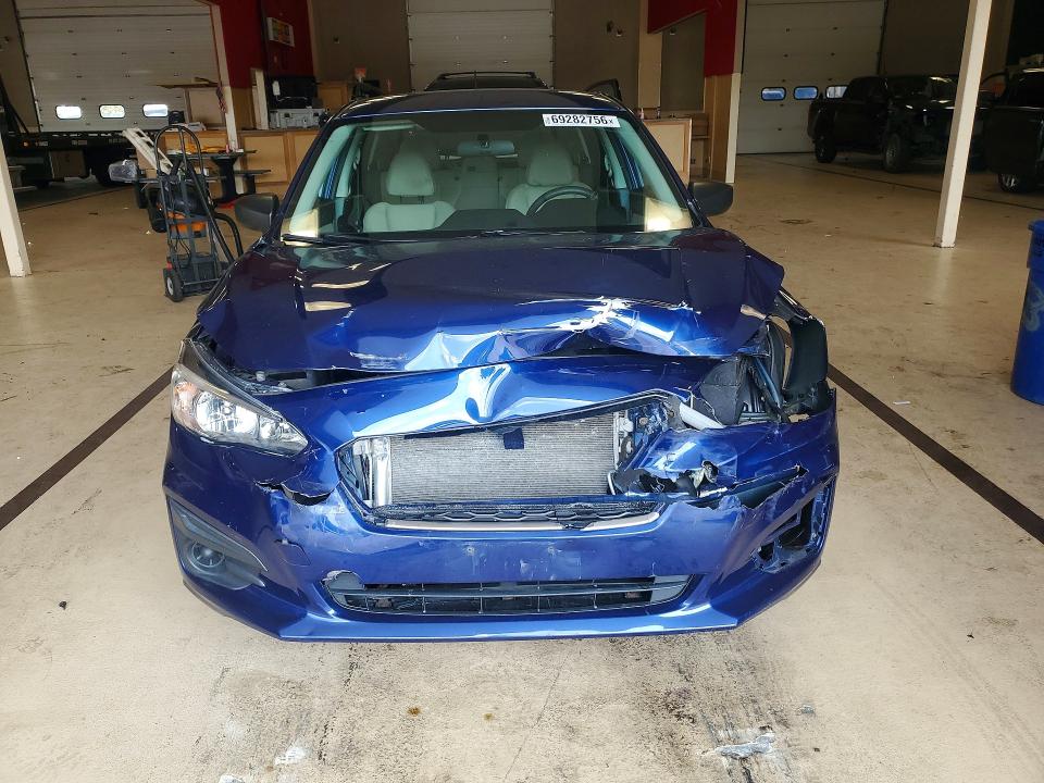 Photo 5 from auction – 2017 SUBARU IMPREZA with VIN 4S3GTAA68H3720851