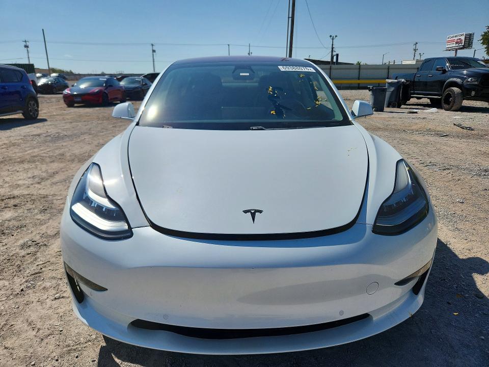 Photo 5 from auction – 2018 TESLA MODEL 3 with VIN 5YJ3E1EA7JF019637