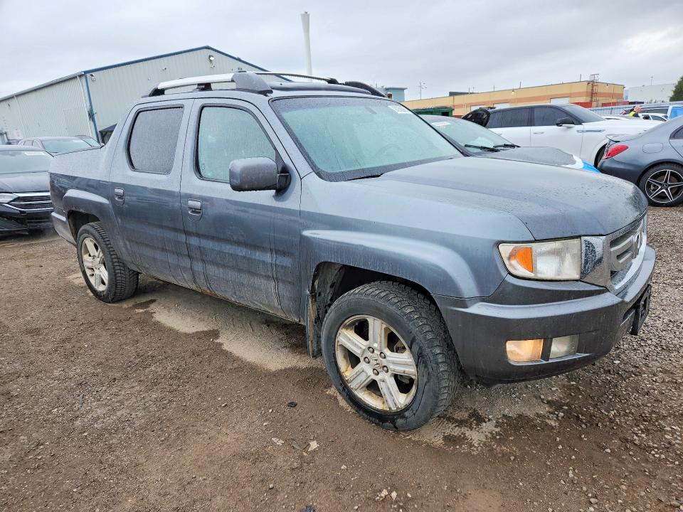 Photo 4 from auction – 2010 HONDA RIDGELINE with VIN 5FPYK1F58AB503498