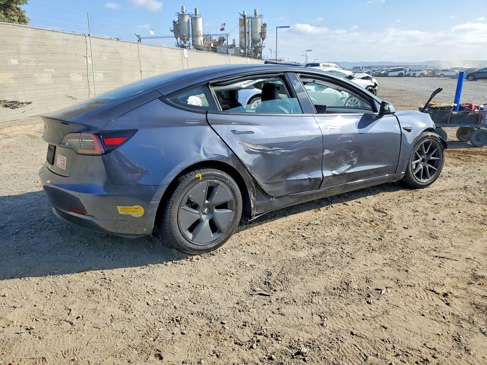 Снимка 3 от търг – 2021 TESLA MODEL 3 с VIN 5YJ3E1EA1MF940076