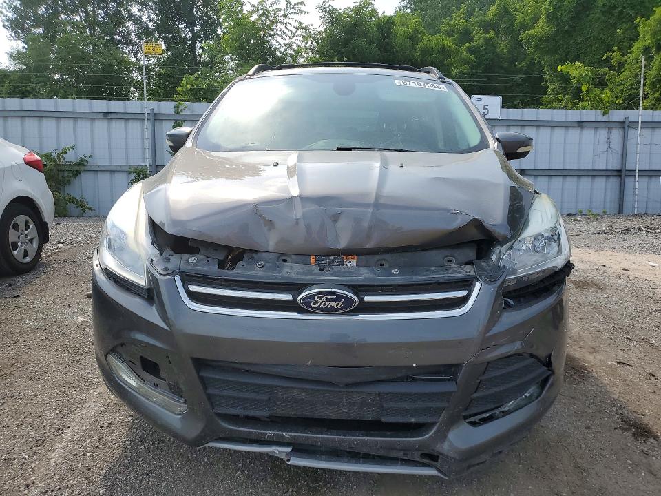 Photo 5 from auction – 2013 FORD ESCAPE with VIN 1FMCU0H91DUA31921