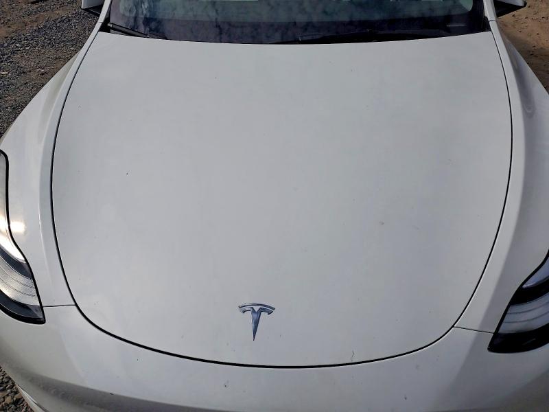 Photo 11 from auction – 2021 TESLA MODEL Y with VIN 5YJYGAEE4MF211394