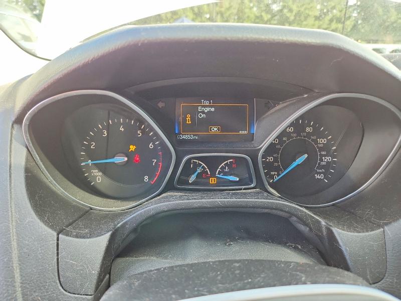 Снимка 9 от търг – 2018 FORD FOCUS с VIN 1FADP3E27JL313903