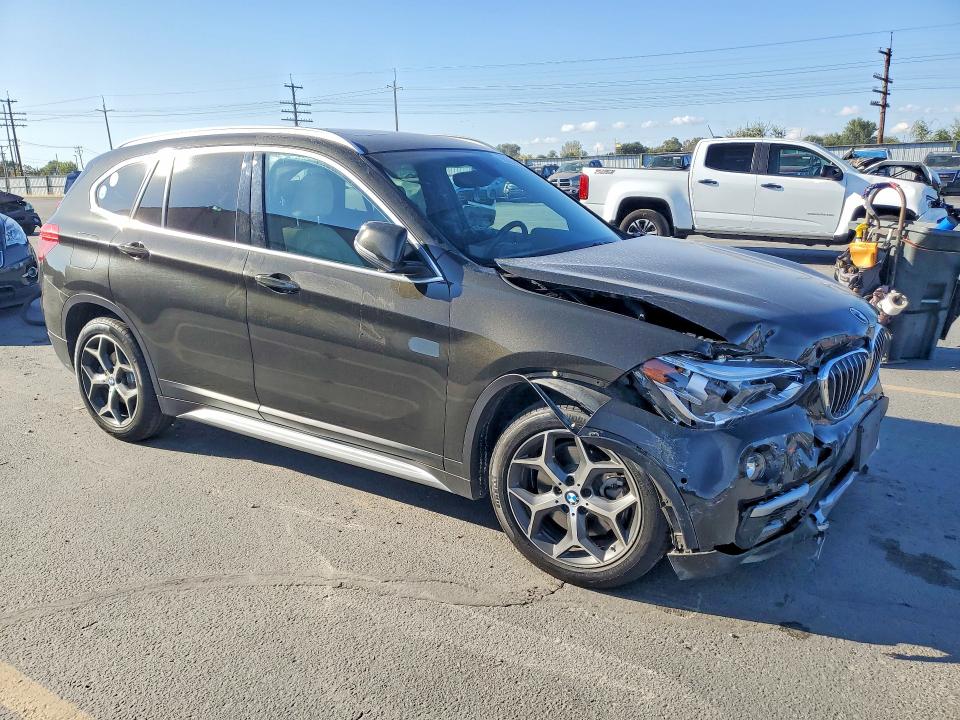 Photo 4 from auction – 2017 BMW X1 with VIN WBXHT3C31H5F80316
