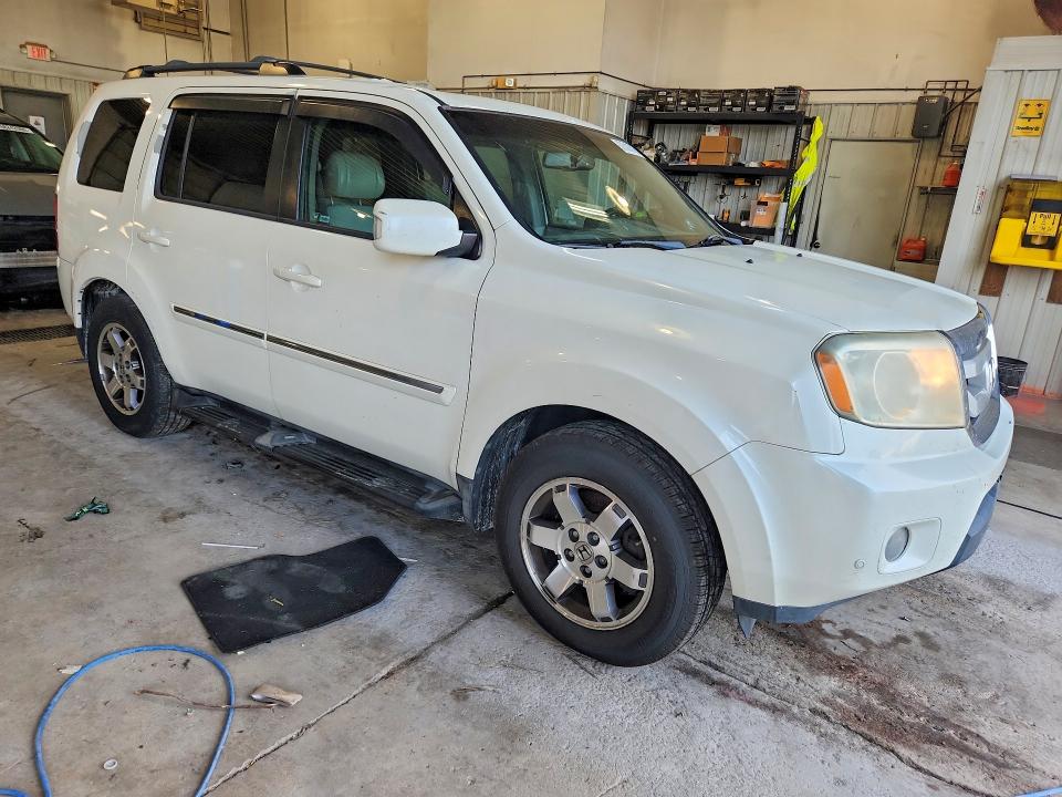 Снимка 4 от търг – 2011 HONDA PILOT с VIN 5FNYF4H92BB049121