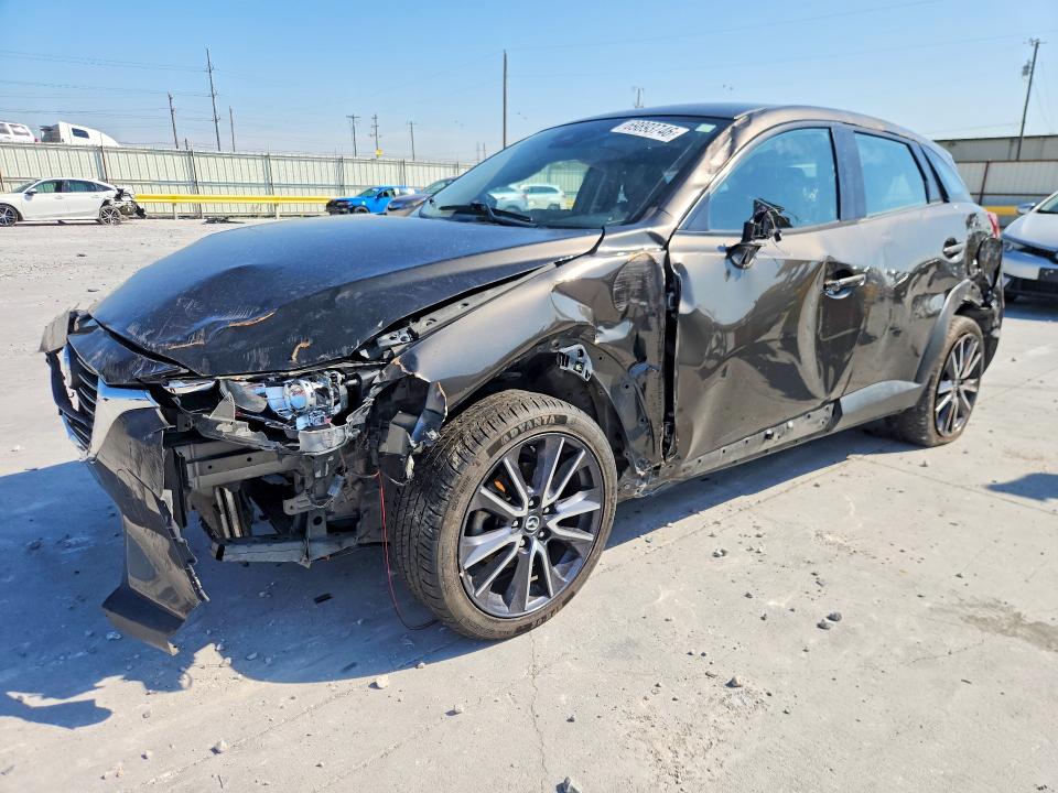 MAZDA CX-3 2018 с VIN JM1DKFC77J0319047 - Снимка от търг