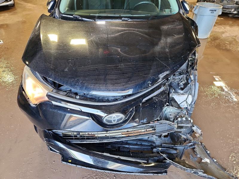 Photo 12 from auction – 2018 TOYOTA RAV4 with VIN 2T3BFREV6JW766554