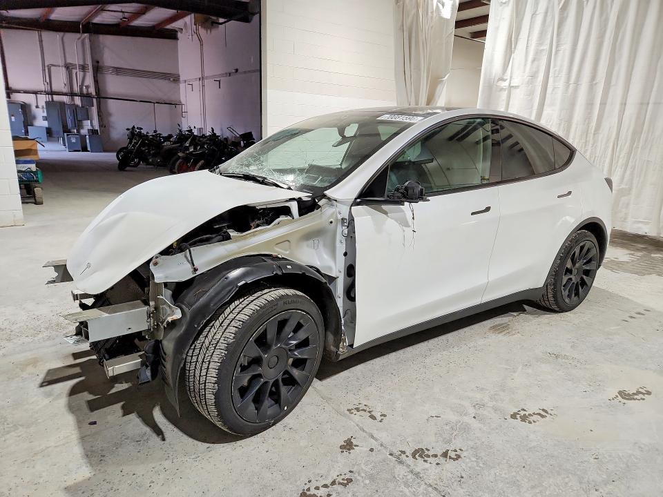 TESLA MODEL Y 2022 with VIN 7SAYGAEE1NF518882 - Photo from auction