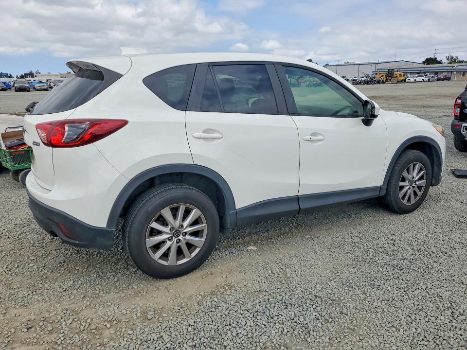 Photo 3 from auction – 2015 MAZDA CX-5 with VIN JM3KE2CY5F0455966