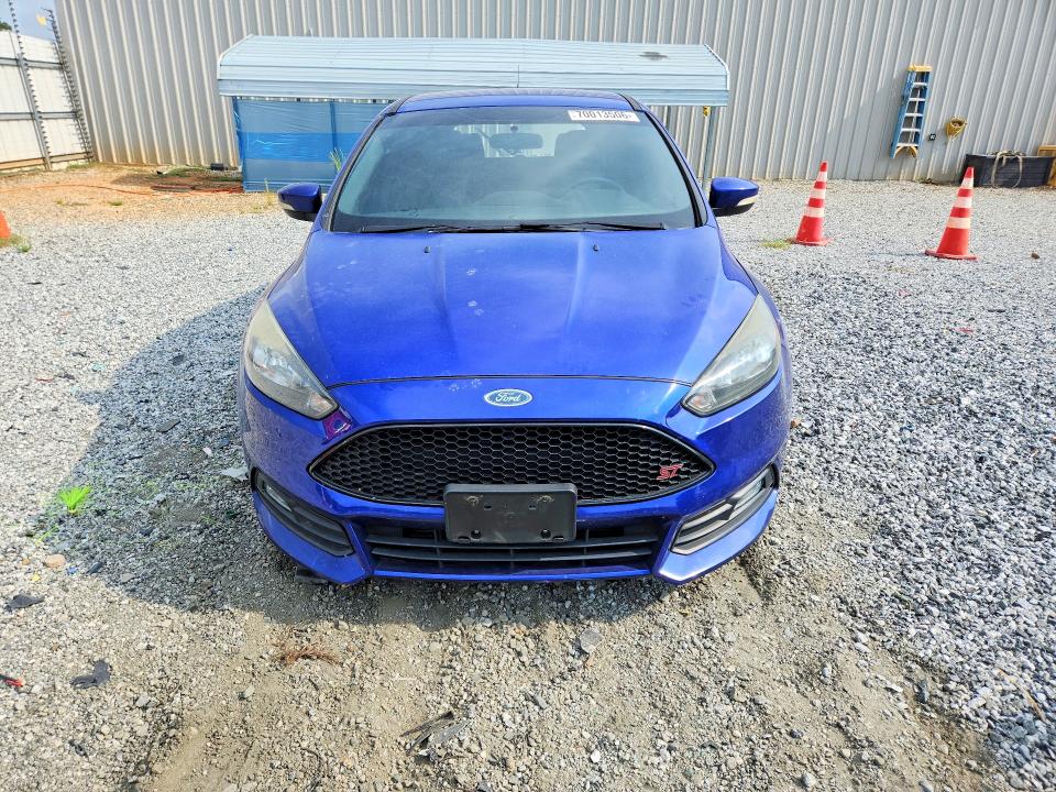Foto 5 de la subasta – 2015 FORD FOCUS con VIN 1FADP3L91FL246397