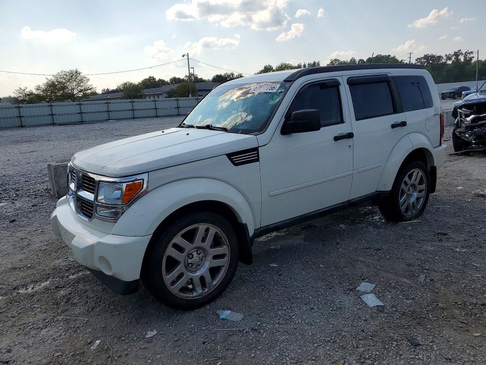 DODGE NITRO 2010 with VIN 1D4PU2GKXAW107094 - Photo from auction
