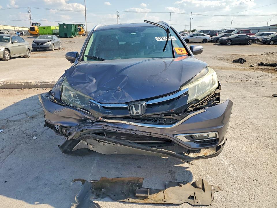 Photo 5 from auction – 2015 HONDA CR-V with VIN 5J6RM4H92FL105324