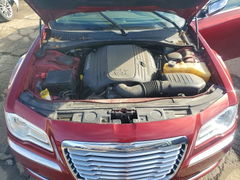 Photo 11 from auction – 2014 CHRYSLER 300C with VIN 2C3CCAKT6EH105926