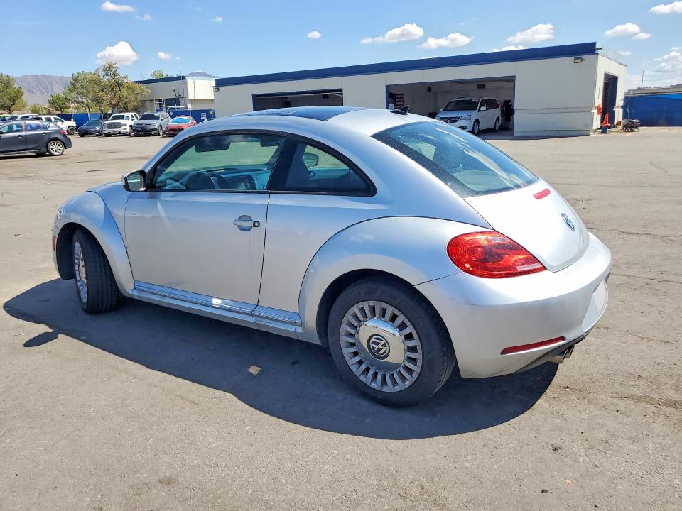 Photo 2 from auction – 2013 VOLKSWAGEN BEETLE with VIN 3VWJP7AT7DM676673