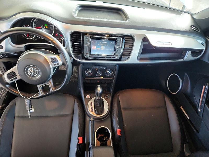 Photo 8 from auction – 2016 VOLKSWAGEN BEETLE with VIN 3VW507AT2GM803954