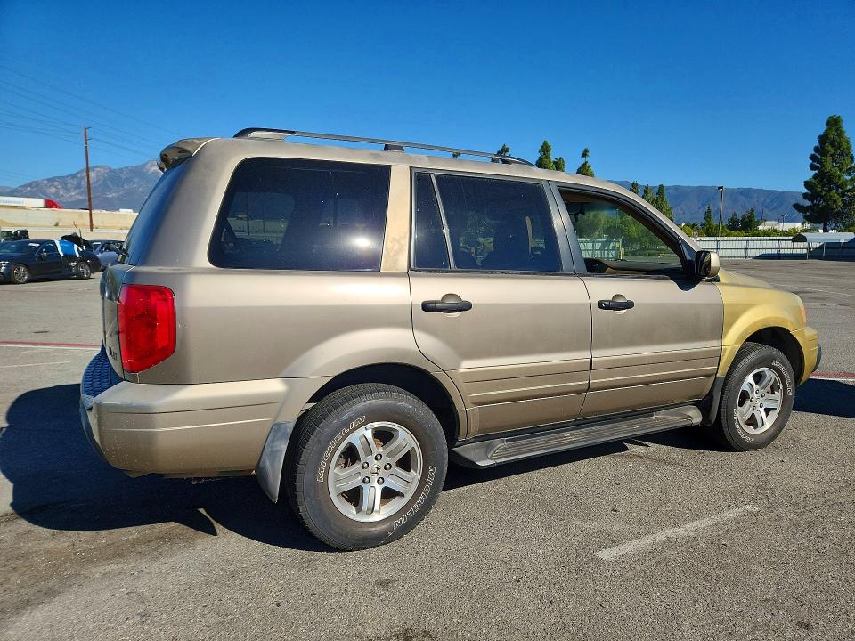 Снимка 3 от търг – 2003 HONDA PILOT с VIN 2HKYF18513H545168