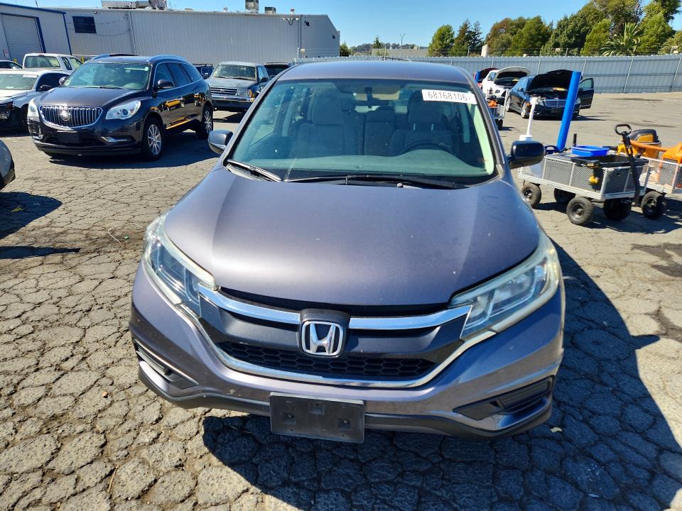 Photo 5 from auction – 2015 HONDA CR-V with VIN 3CZRM3H32FG717655