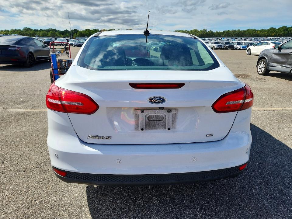 Снимка 6 от търг – 2016 FORD FOCUS с VIN 1FADP3F21GL223654