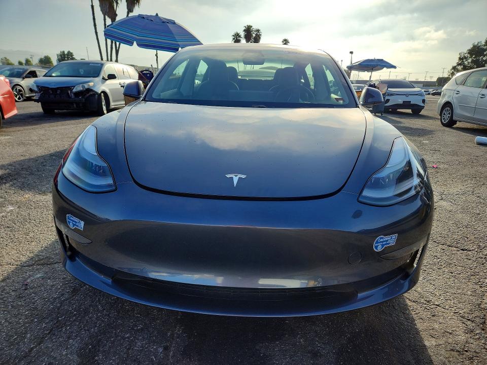 Photo 5 from auction – 2021 TESLA MODEL 3 with VIN 5YJ3E1EB1MF997791