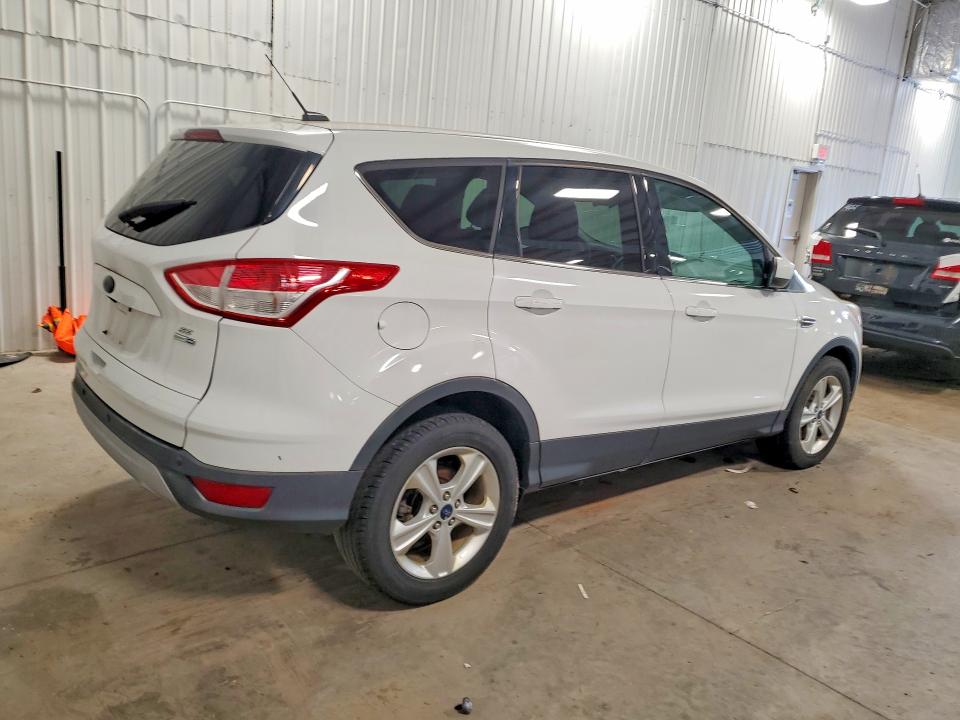 Photo 3 from auction – 2014 FORD ESCAPE with VIN 1FMCU9G97EUD59433