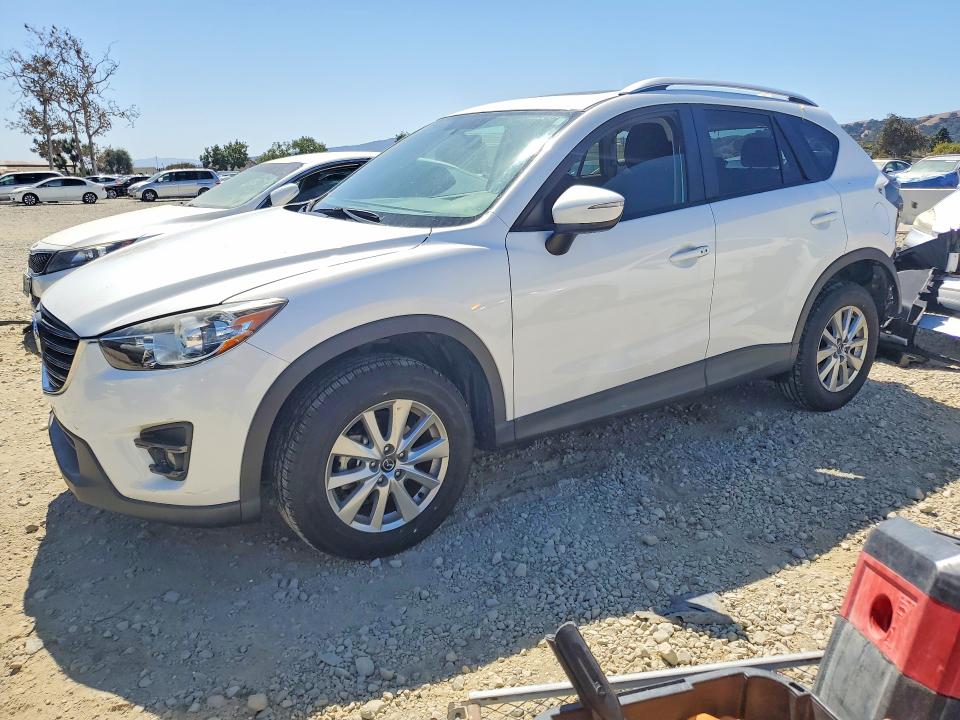 Photo 1 from auction – 2016 MAZDA CX-5 with VIN JM3KE2CY8G0830895