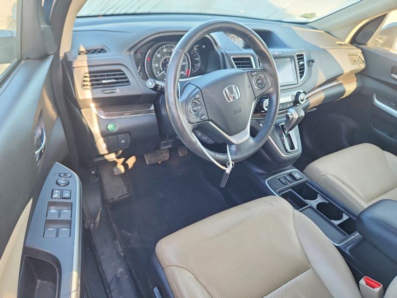 Photo 8 from auction – 2016 HONDA CR-V with VIN 2HKRM3H73GH568416