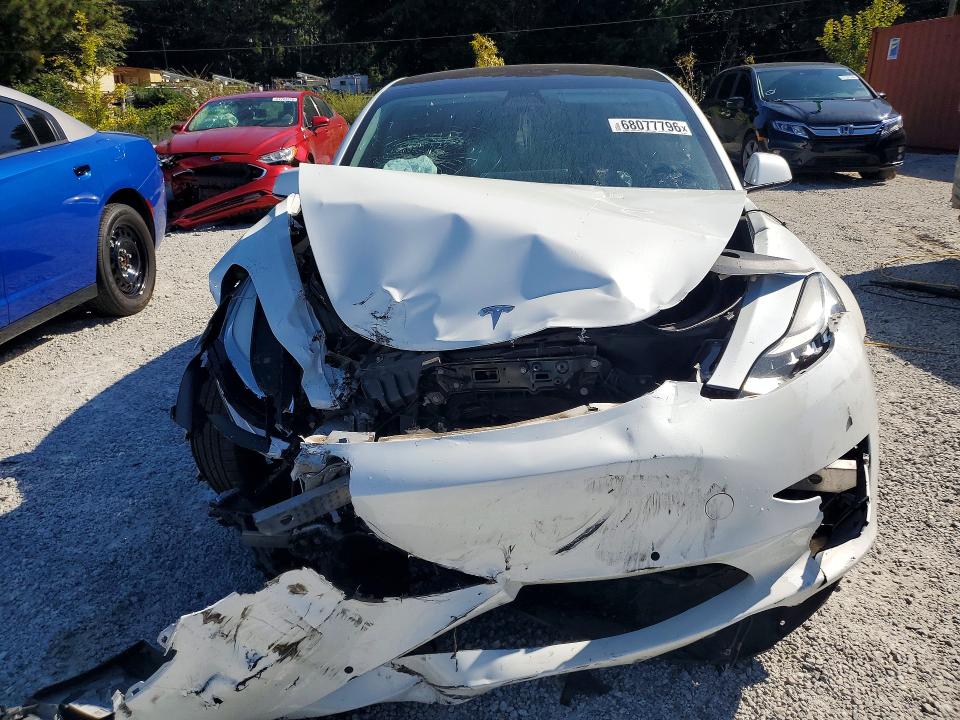 Foto 5 de la subasta – 2018 TESLA MODEL 3 con VIN 5YJ3E1EA6JF046019