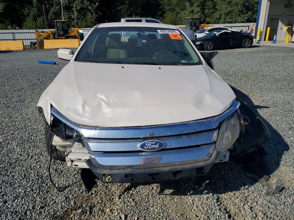 Фото 5 с аукциона – 2011 FORD FUSION с VIN 3FADP0L30BR129867