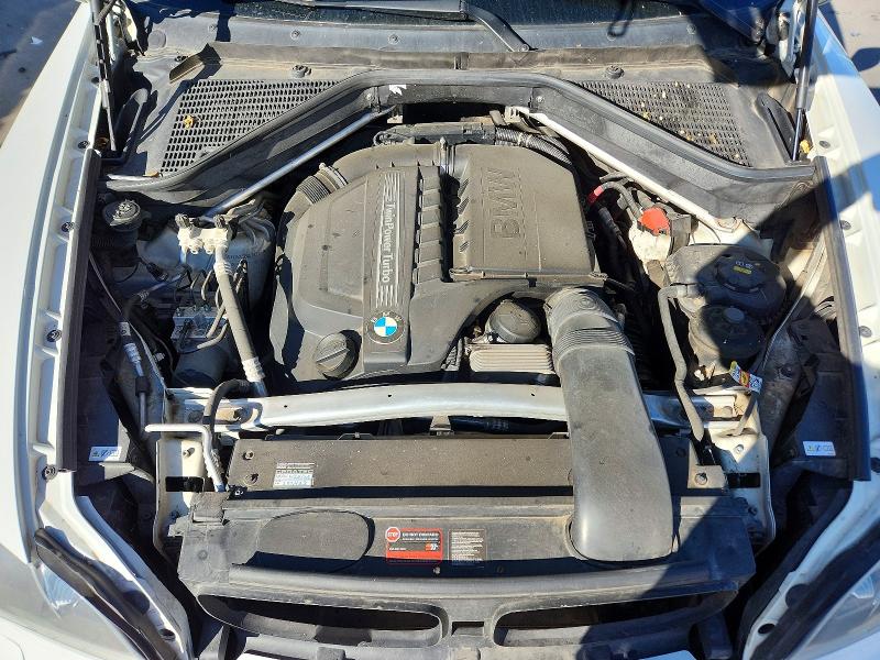 Photo 12 from auction – 2012 BMW X5 with VIN 5UXZV4C56CL762113