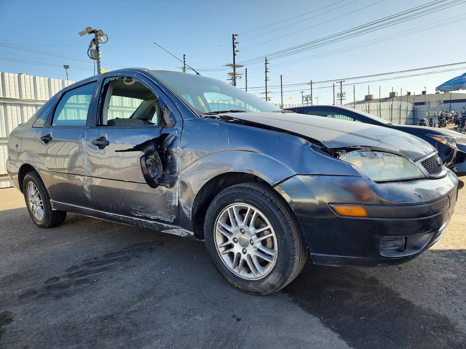Снимка 4 от търг – 2007 FORD FOCUS с VIN 1FAFP34N17W108010