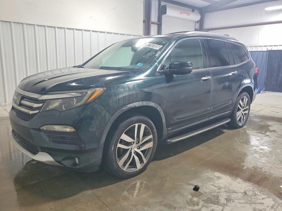 HONDA PILOT 2017 with VIN 5FNYF6H91HB035800 - Photo from auction