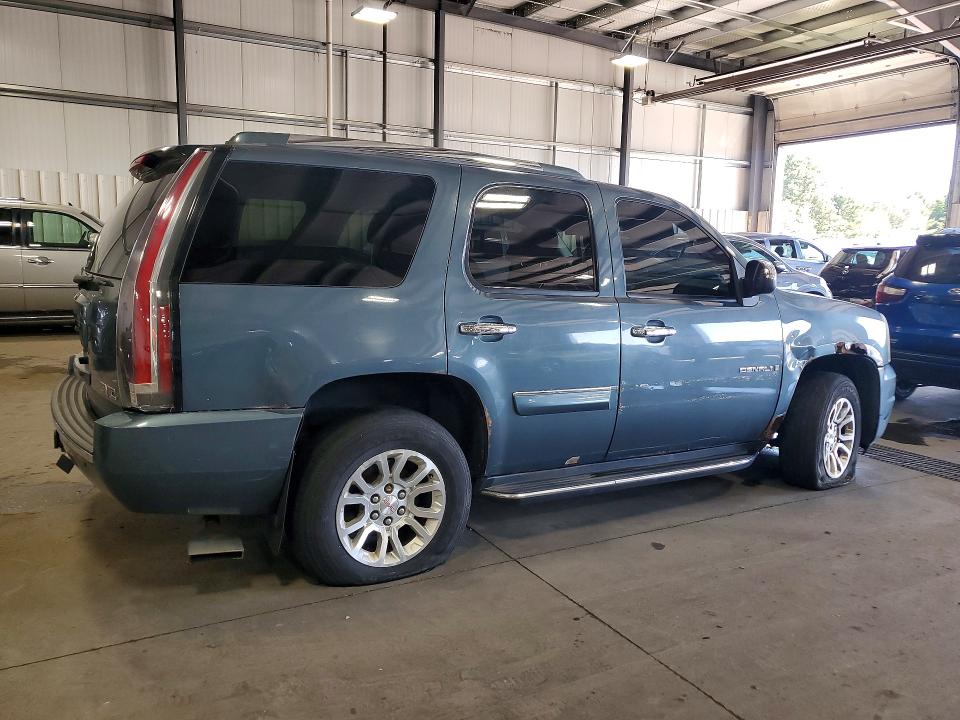 Снимка 3 от търг – 2007 GMC YUKON с VIN 1GKFK63847J342200
