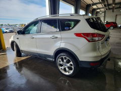 Photo 2 from auction – 2016 FORD ESCAPE with VIN 1FMCU9J95GUC59357