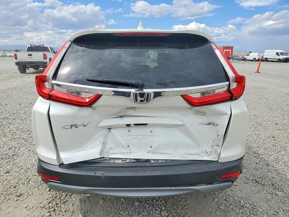 Photo 6 from auction – 2018 HONDA CR-V with VIN 2HKRW2H85JH657733