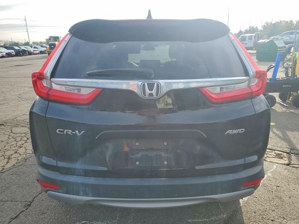 Photo 6 from auction – 2019 HONDA CR-V with VIN 7FARW2H5XKE036997