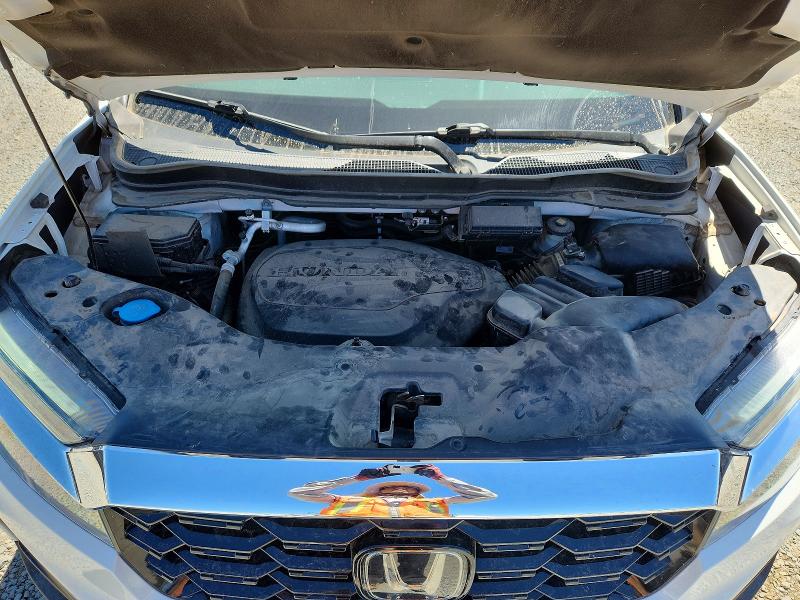 Photo 12 from auction – 2023 HONDA PASSPORT with VIN 5FNYF8H03PB005936