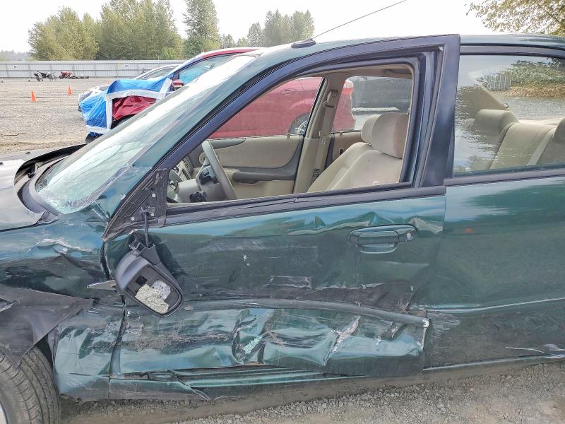 Photo 7 from auction – 2002 MAZDA PROTEGE with VIN JM1BJ225020582145