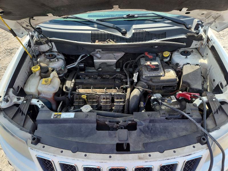 Photo 12 from auction – 2014 JEEP COMPASS with VIN 1C4NJCBA7ED743006