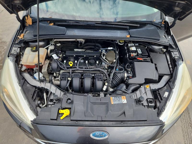 Photo 11 from auction – 2015 FORD FOCUS with VIN 1FADP3F26FL349989