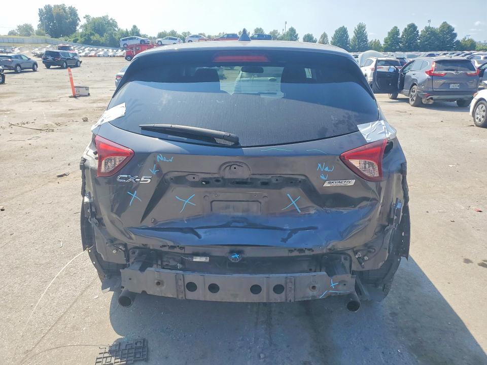 Photo 6 from auction – 2016 MAZDA CX-5 with VIN JM3KE2CYXG0620122