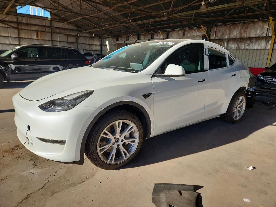TESLA MODEL Y 2022 with VIN 7SAYGDEE9NA015776 - Photo from auction