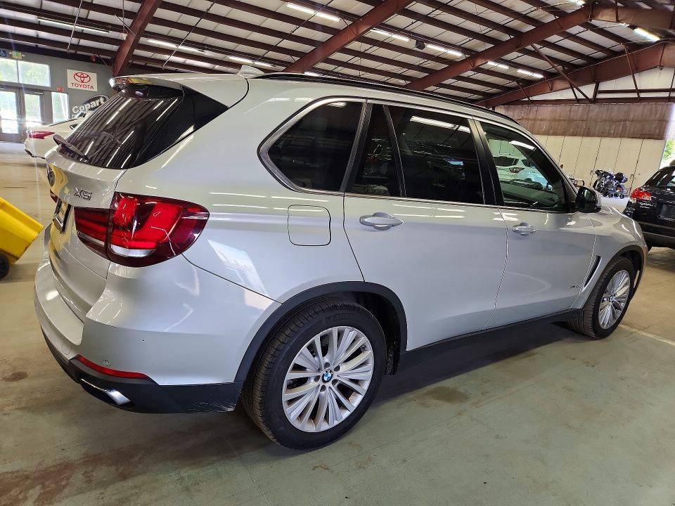 Photo 3 from auction – 2014 BMW X5 with VIN 5UXKR6C56E0J72113