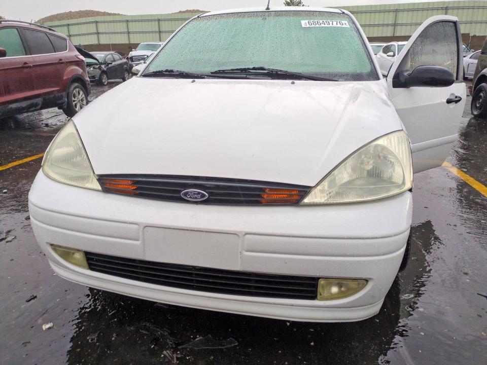 Photo 5 from auction – 2001 FORD FOCUS with VIN 1FAFP38371W209570