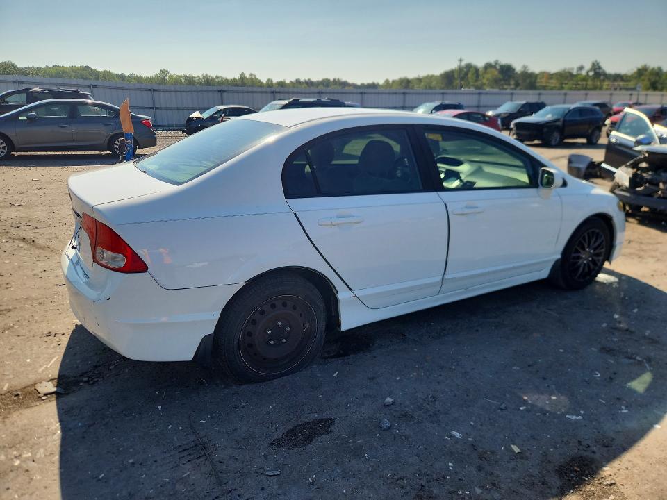Photo 3 from auction – 2011 HONDA ^CIVIC LX with VIN 19XFA1F52BE035374