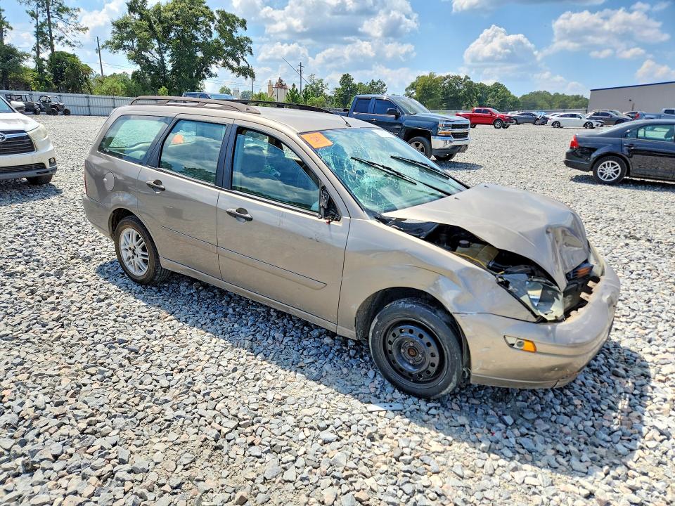 Photo 4 from auction – 2004 FORD FOCUS with VIN 1FAFP35Z64W104063