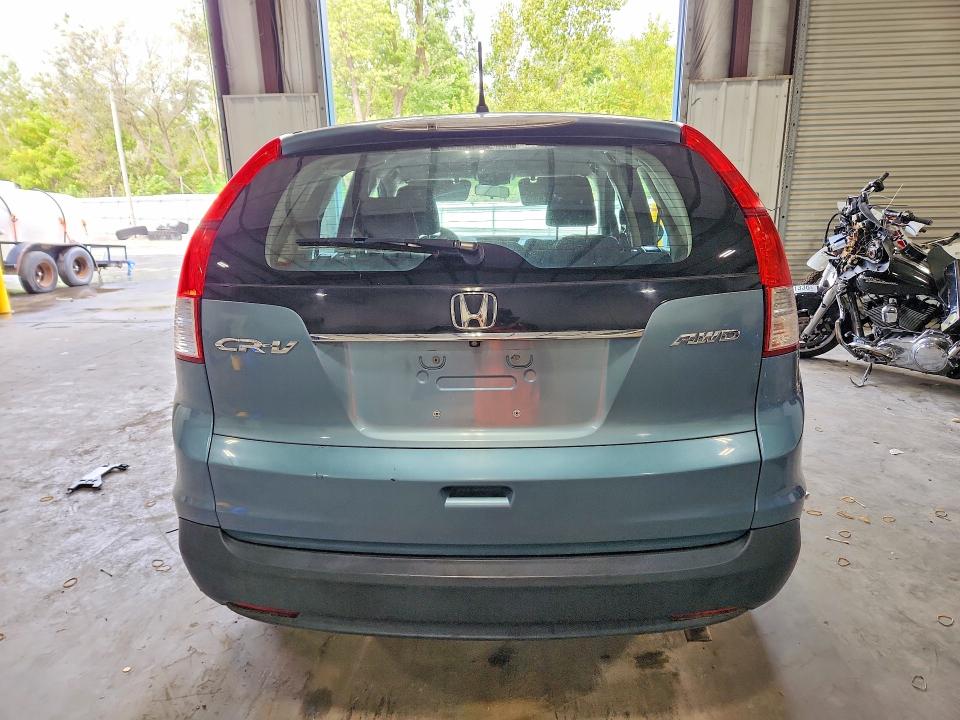 Photo 6 from auction – 2014 HONDA CR-V with VIN 2HKRM4H35EH679890